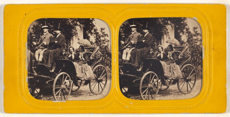 [Two ladies in horse-drawn coach with two men in top hats as their drivers]