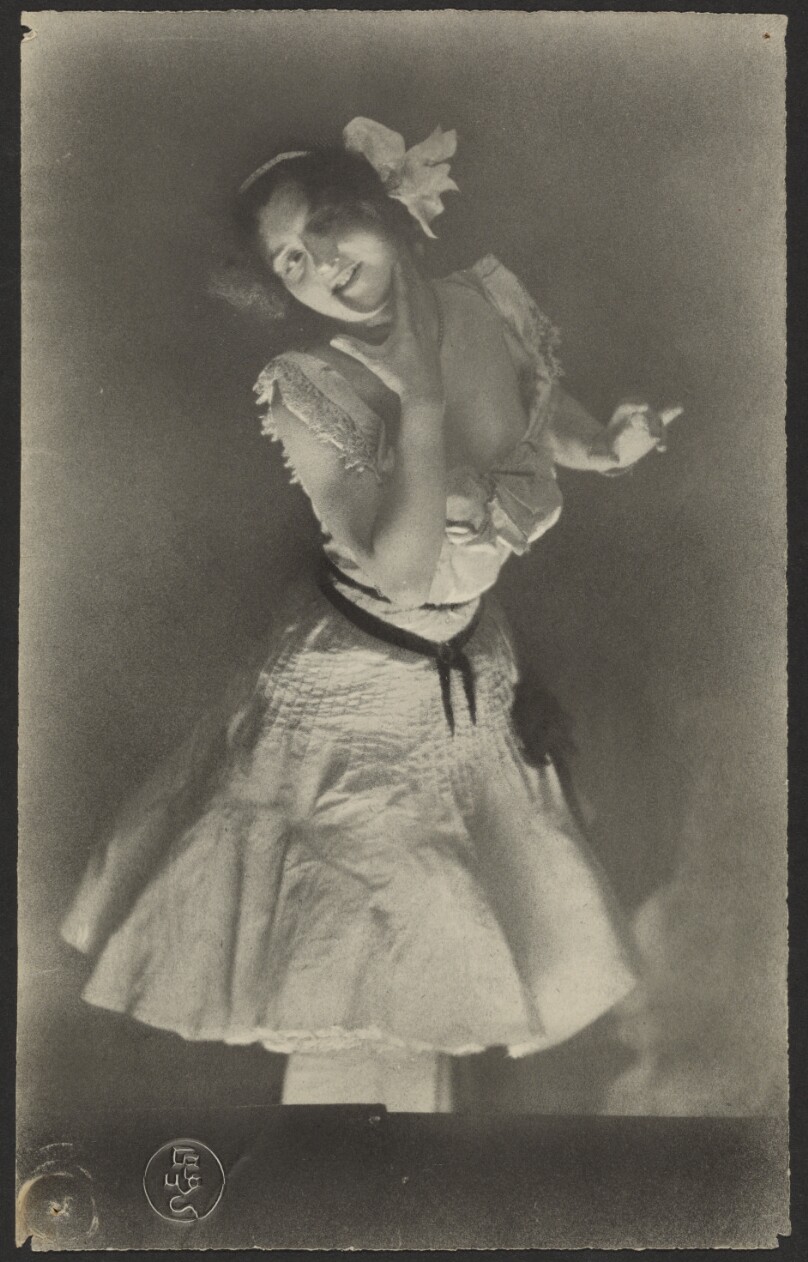 [Portrait of woman in white dress]