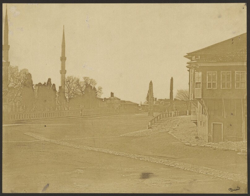 [Street with obelisk]