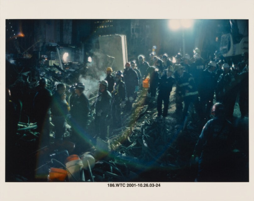 Firemen Looking On As Dead Are Recovered