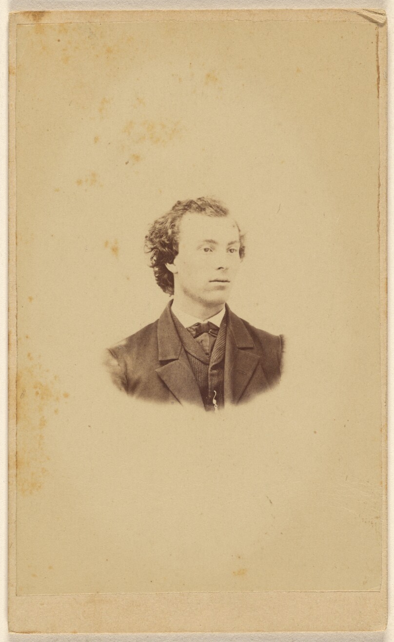 [Unidentified young man, printed vignette-style]