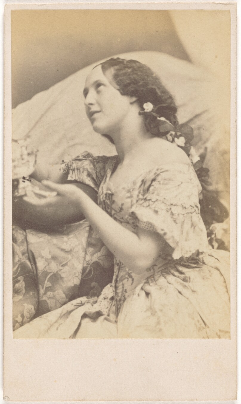 [Seated Young Woman with Flowers in Braided Hair Looking Up to the Ceiling]