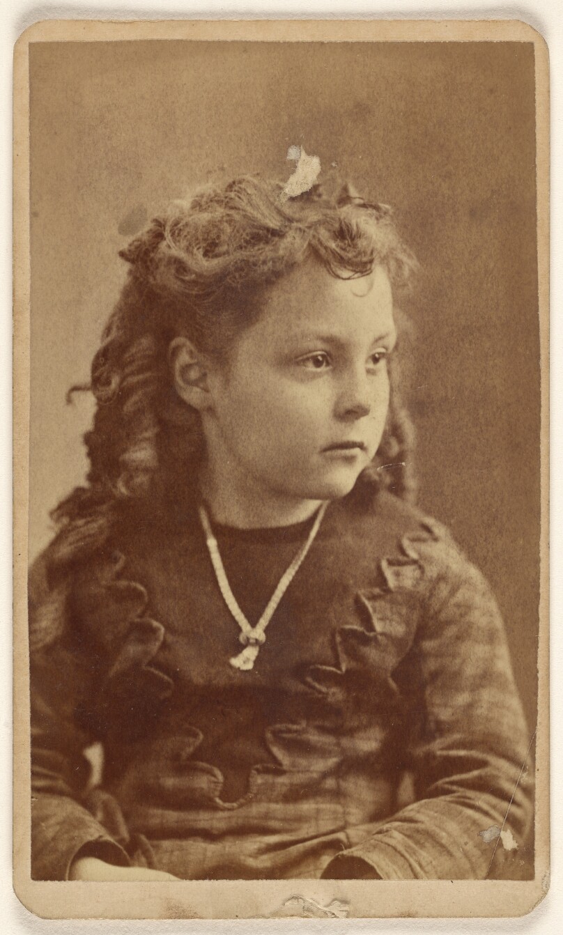 [Unidentified little girl, in 3/4 profile]