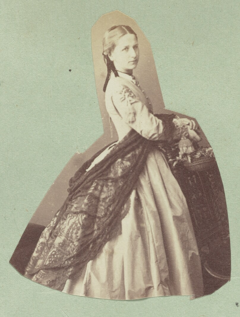 [Portrait of woman with ribbon in her hair]