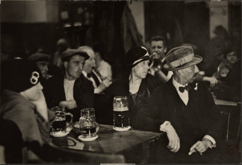 [Men and women with beer]