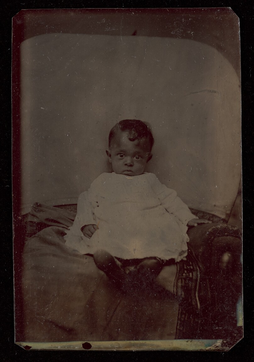 [Portrait of a Seated Child with hidden mother]
