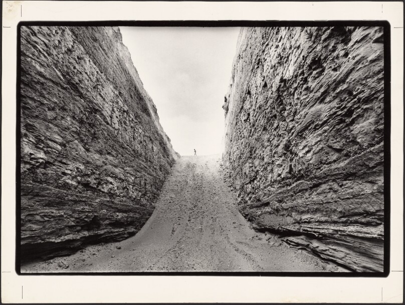 Michael Heizer standing on Double Negative, North Las Vegas, Nevada