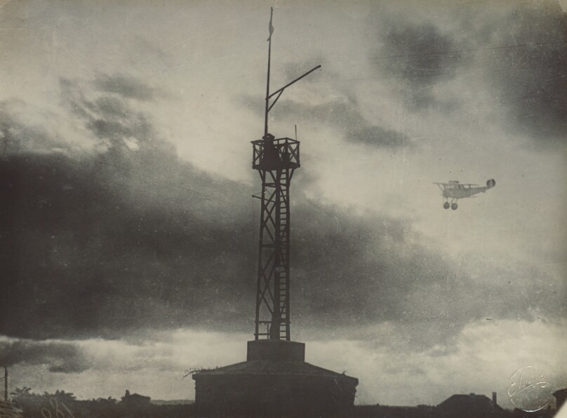 [Airplane and signal tower]