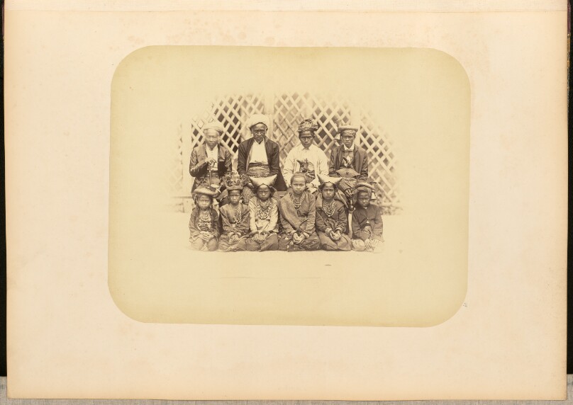[Group portrait of men and children]