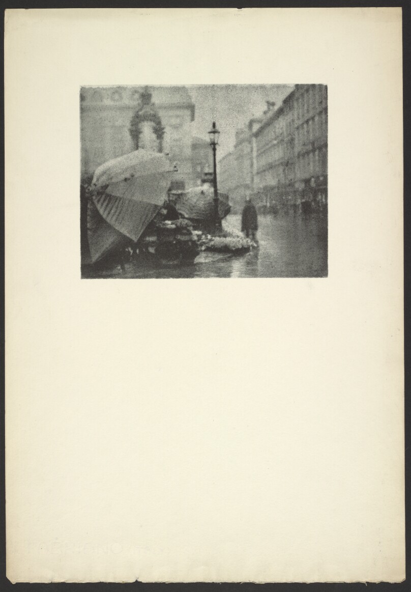 [Rainy street scene]