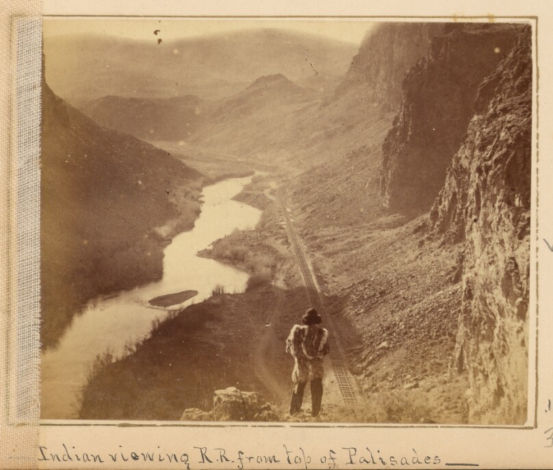[Native American Man Viewing the Railroad from top of Palisades]