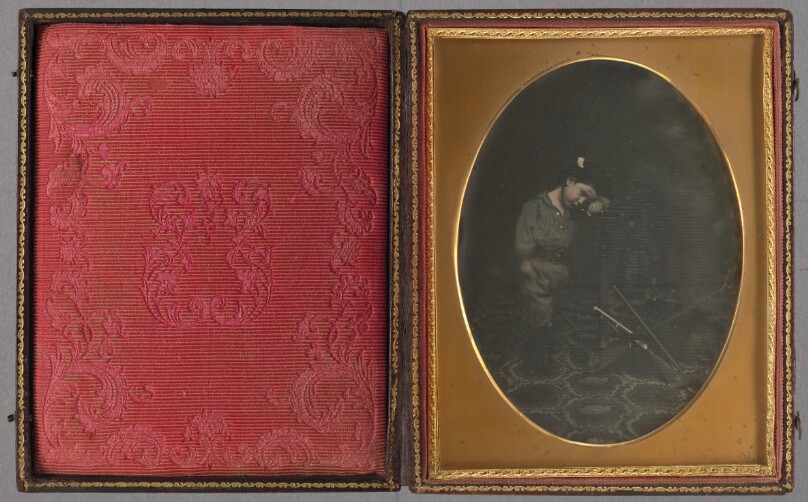Portrait of a Boy with Gold-Mining Toys