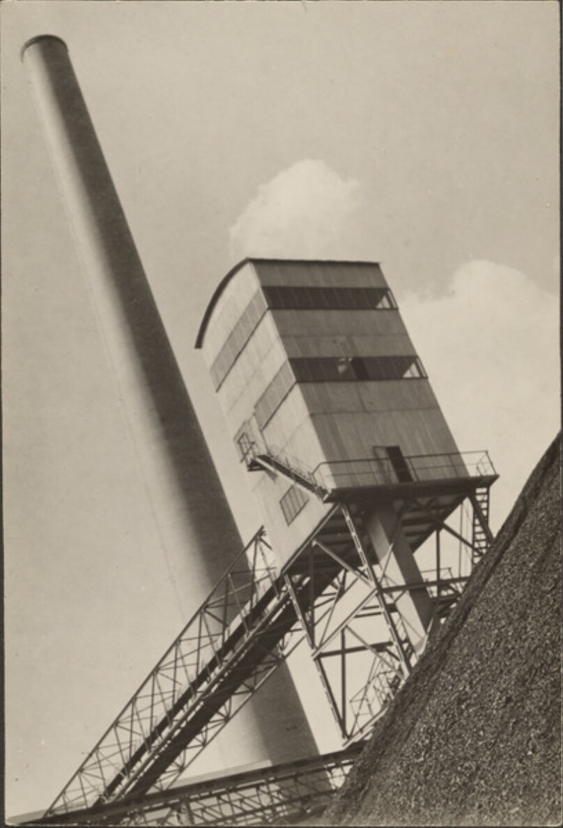 [Industrial building and smokestack]