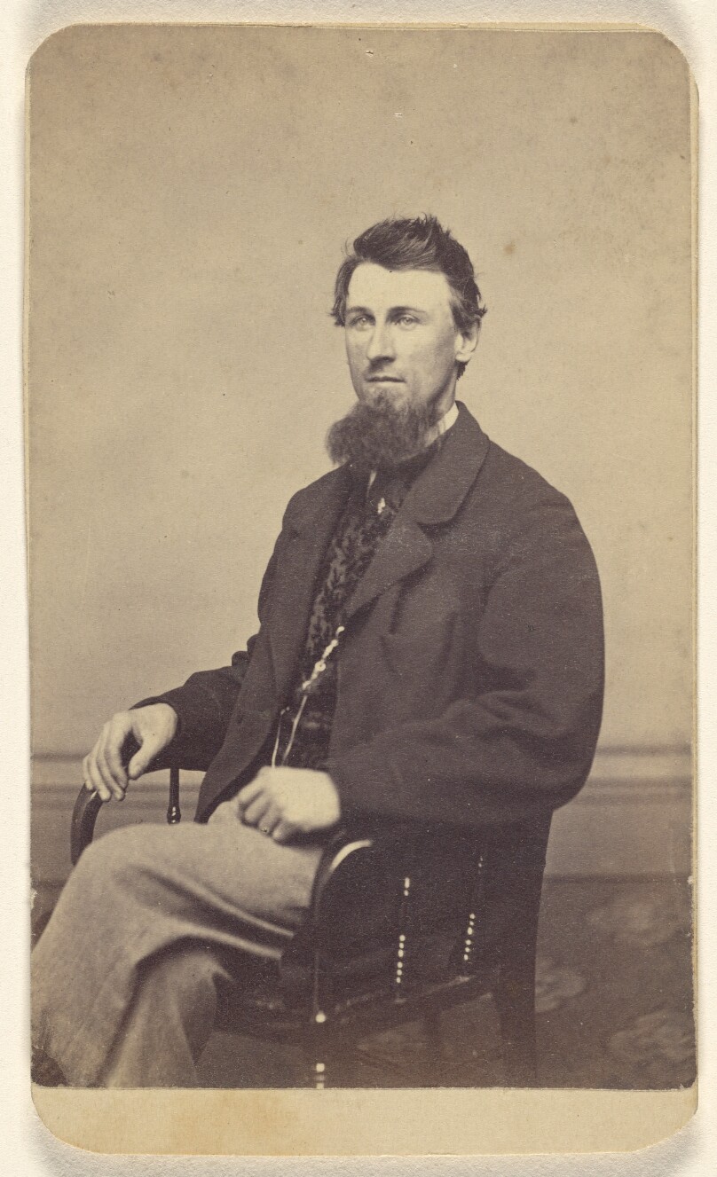 [Unidentified man with long chin beard, seated]