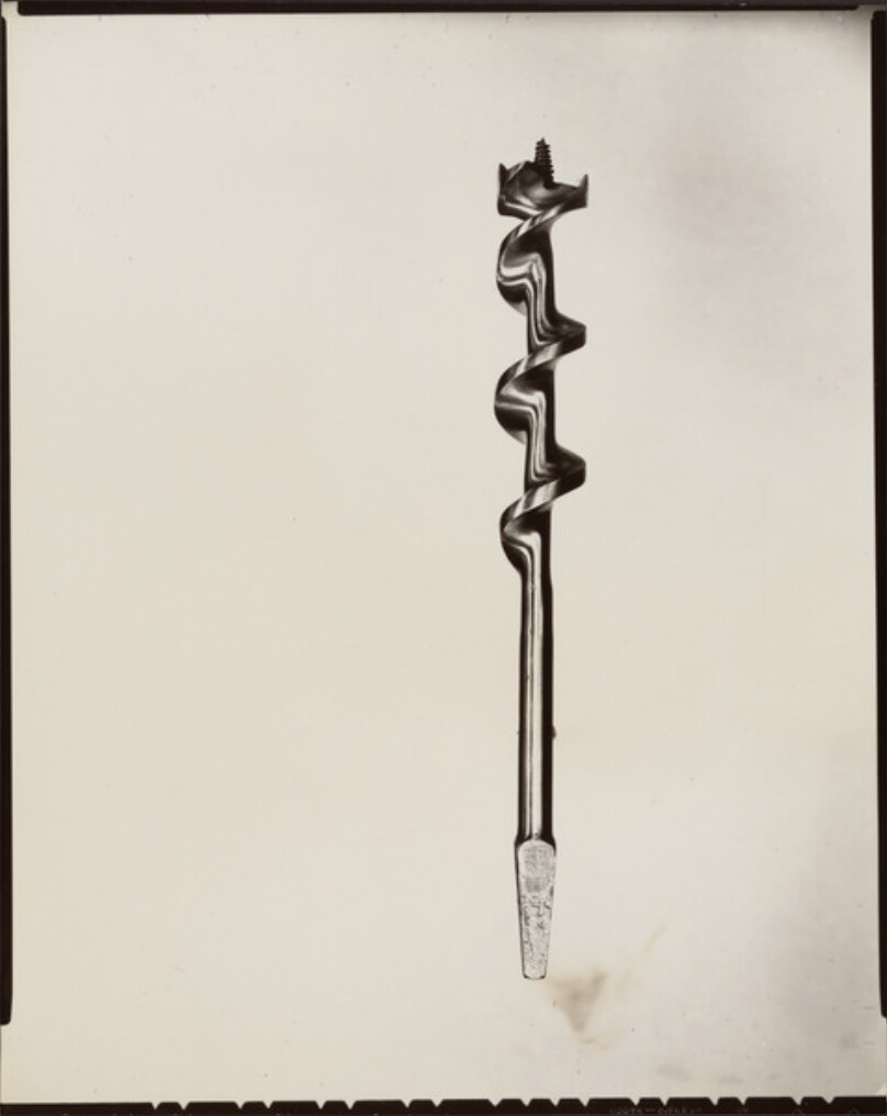 [Auger Drill Bit with a Flared Screwdriver End]