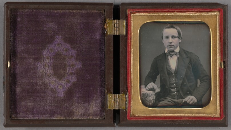 [Portrait of a young man wearing a bow tie, seated]