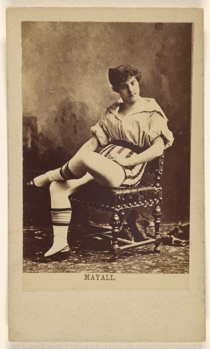 [Seated woman]