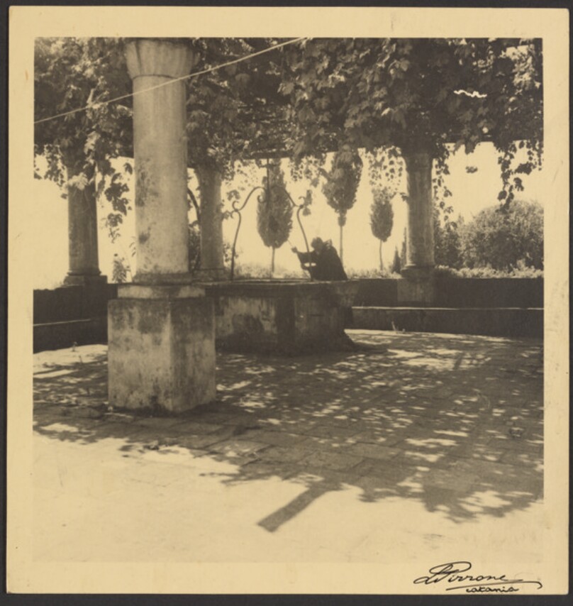 [Monk on patio]