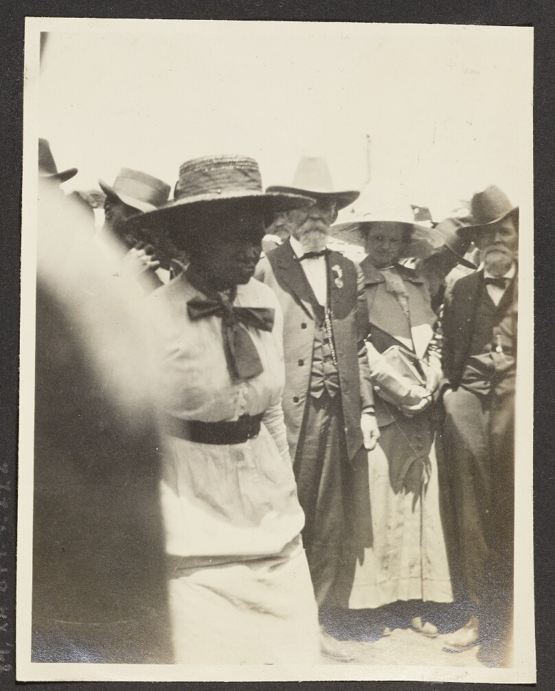 [View of Men and Women Standing Together]