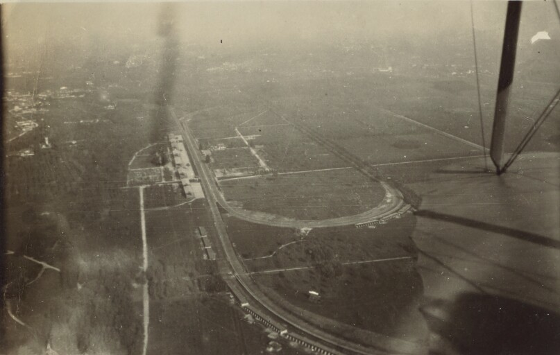 [Aerial shot of airfield]