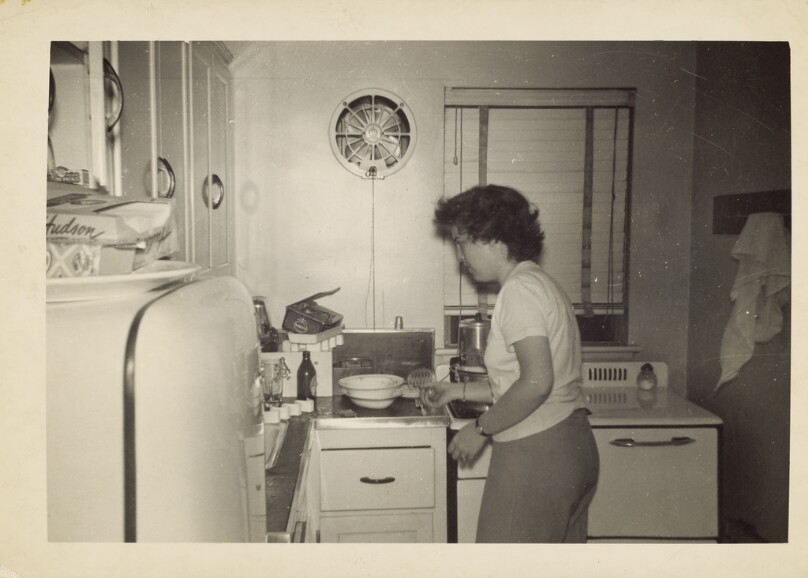 [Woman cooking]