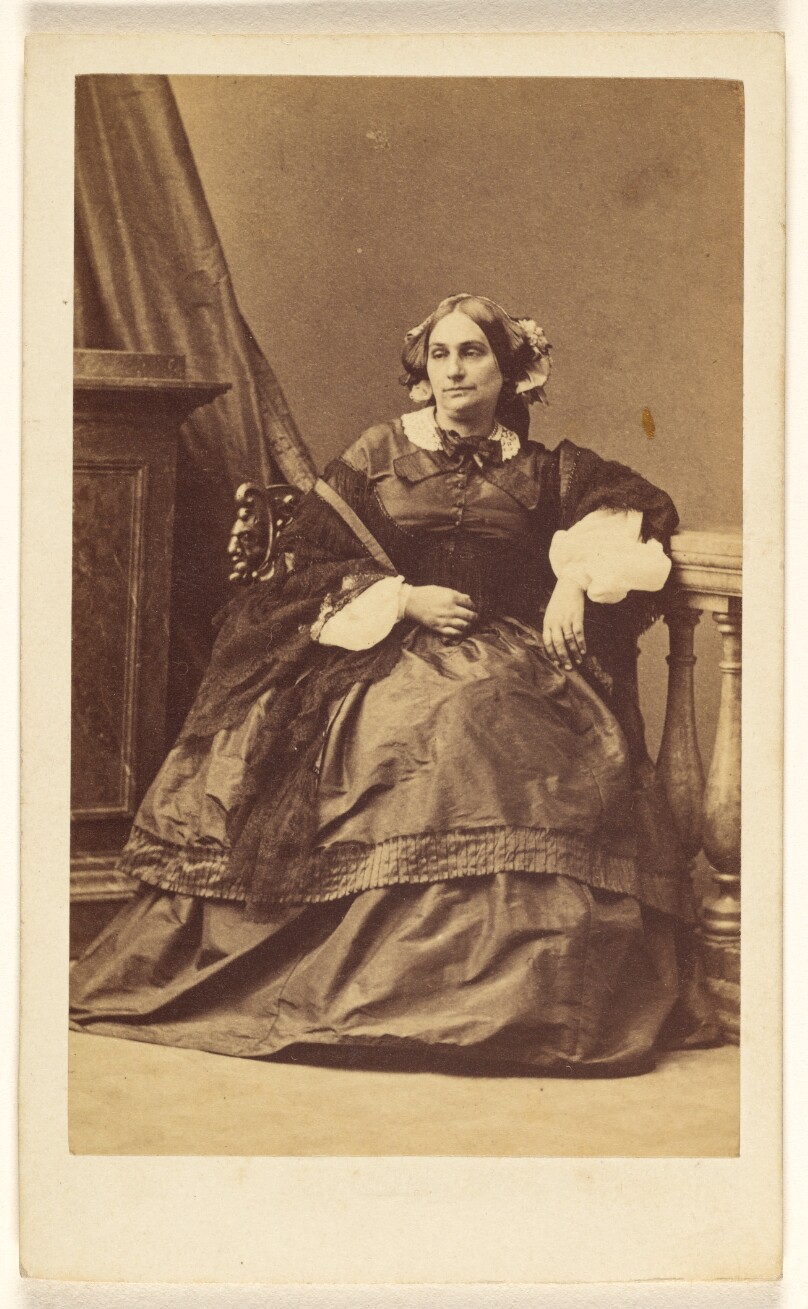[Unidentified woman, seated]