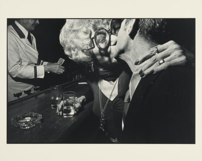 Older Woman Kissing Man