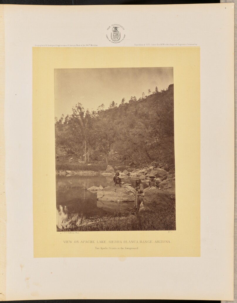 View on Apache Lake, Sierra Blanca Range, Arizona. Two Apache Scouts in the Foreground