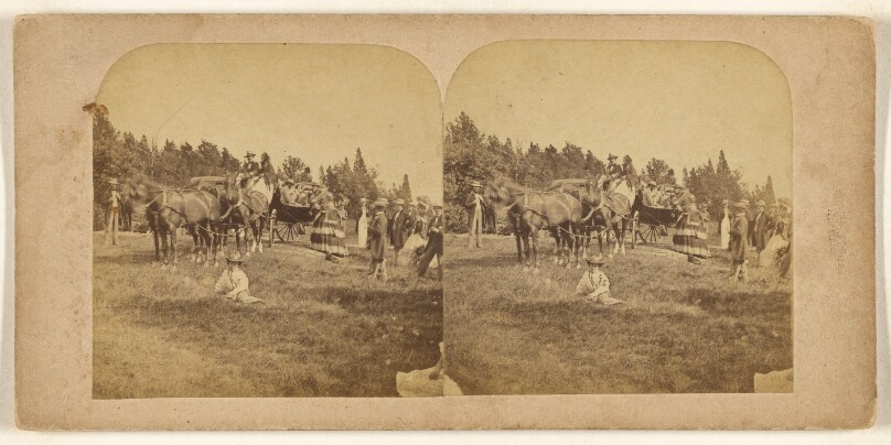 [Group of people in a pastoral scene, one woman seated on ground, others standing, several couples in horse-drawn wagons]