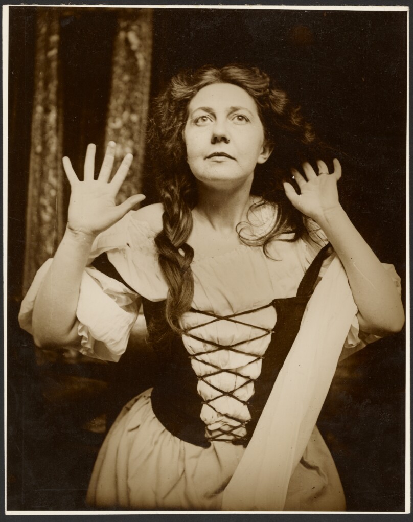 [Female Model in Peasant Costume Posed Looking Up]