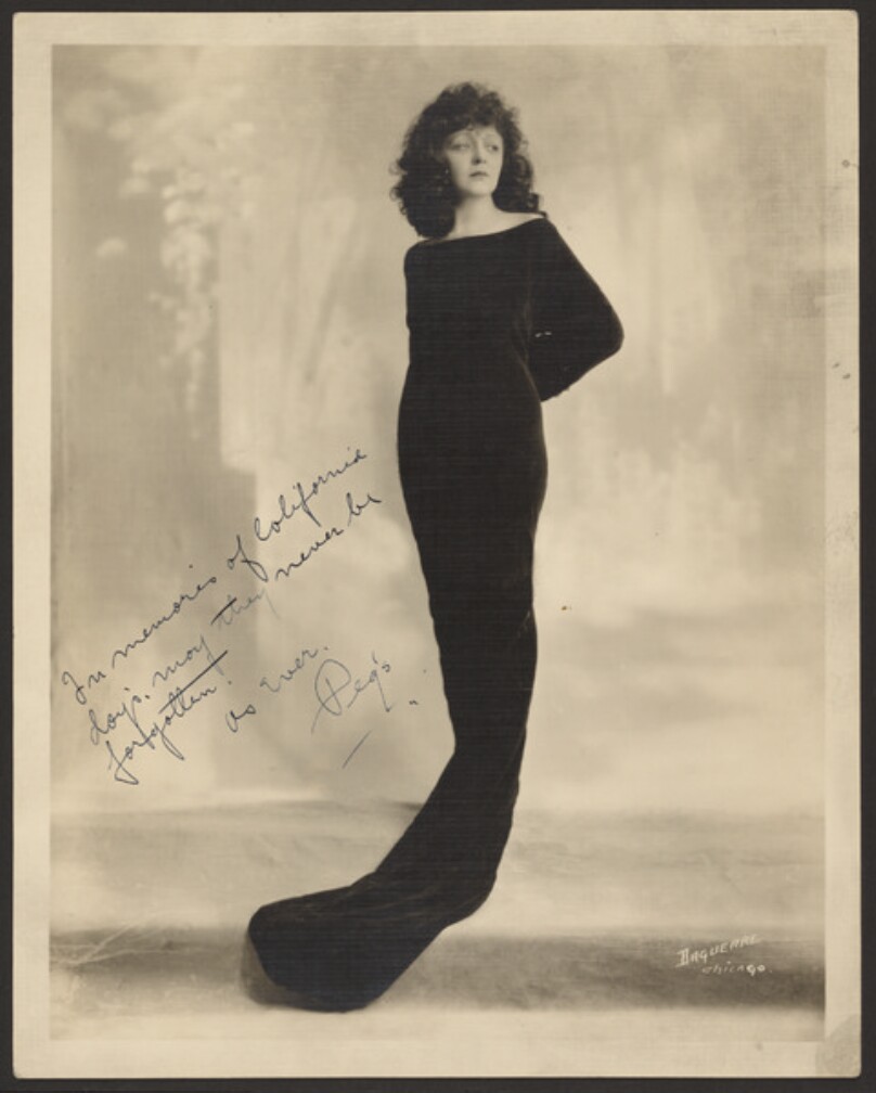 [Portrait of a woman, standing]