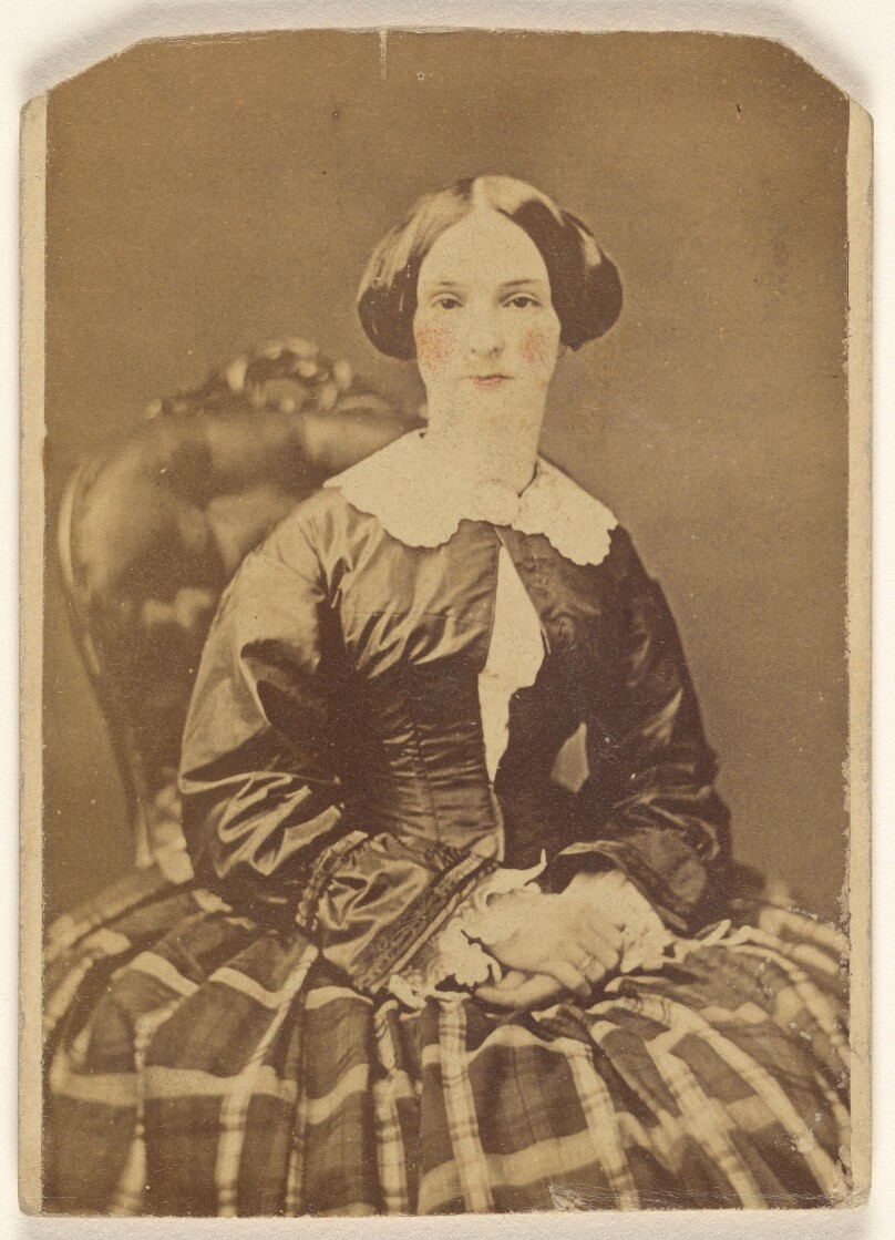 [Unidentified woman, seated]