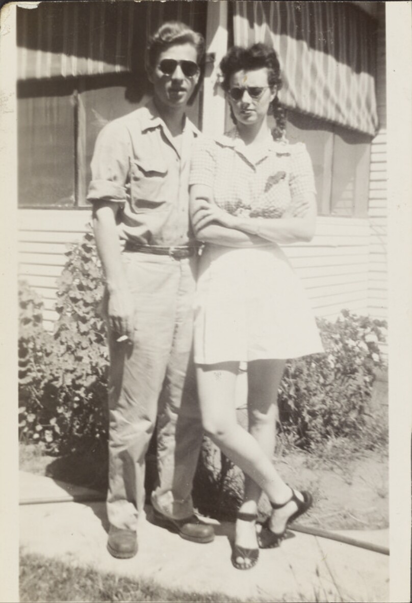 [Couple wearing sunglasses]