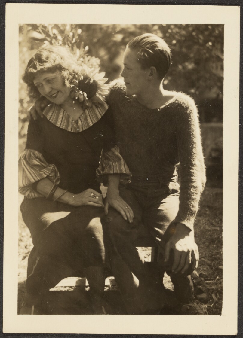 [Young Man and Woman Seated Outside]