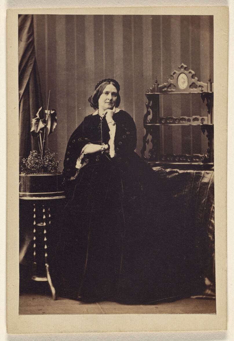 [Unidentified woman, seated]