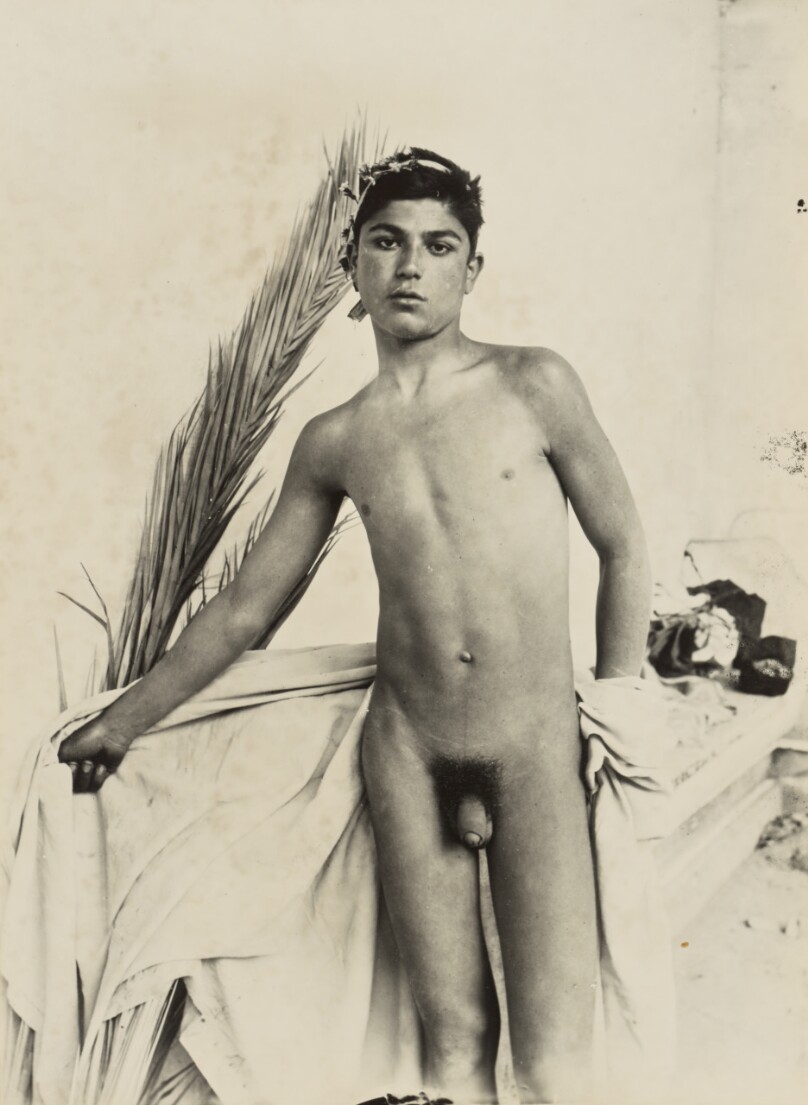 [Boy with palm frond]
