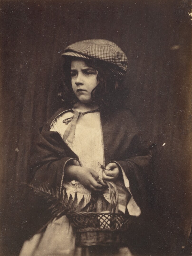 [Young Girl Holding a Basket]