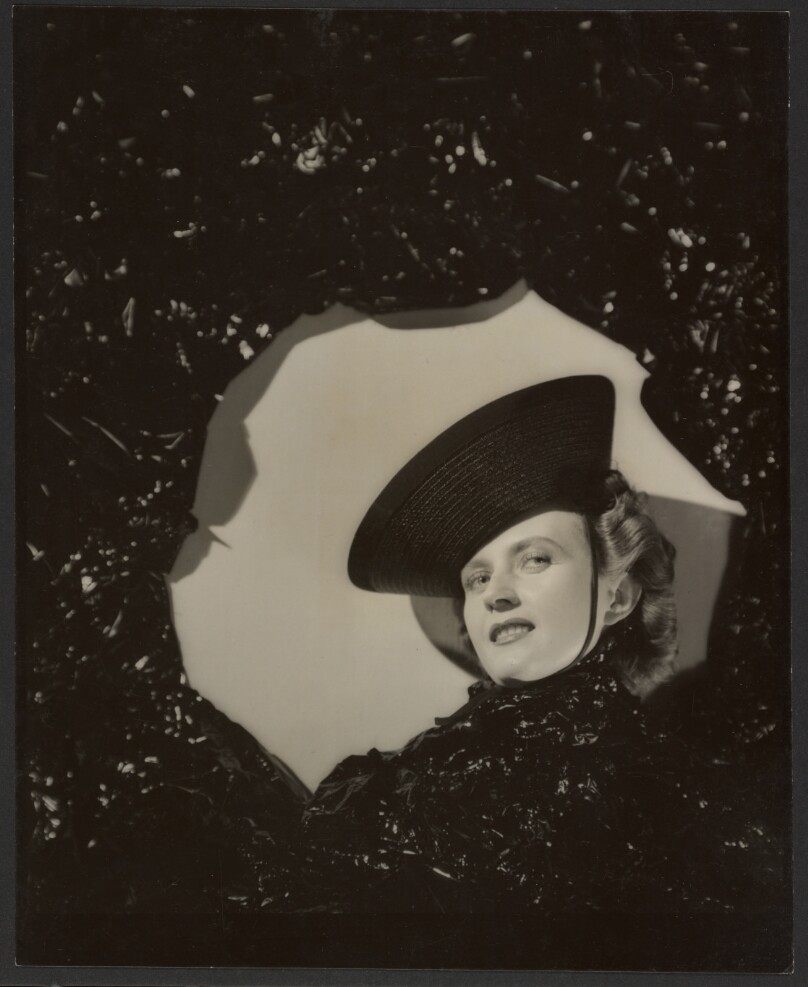 [Woman wearing a hat]