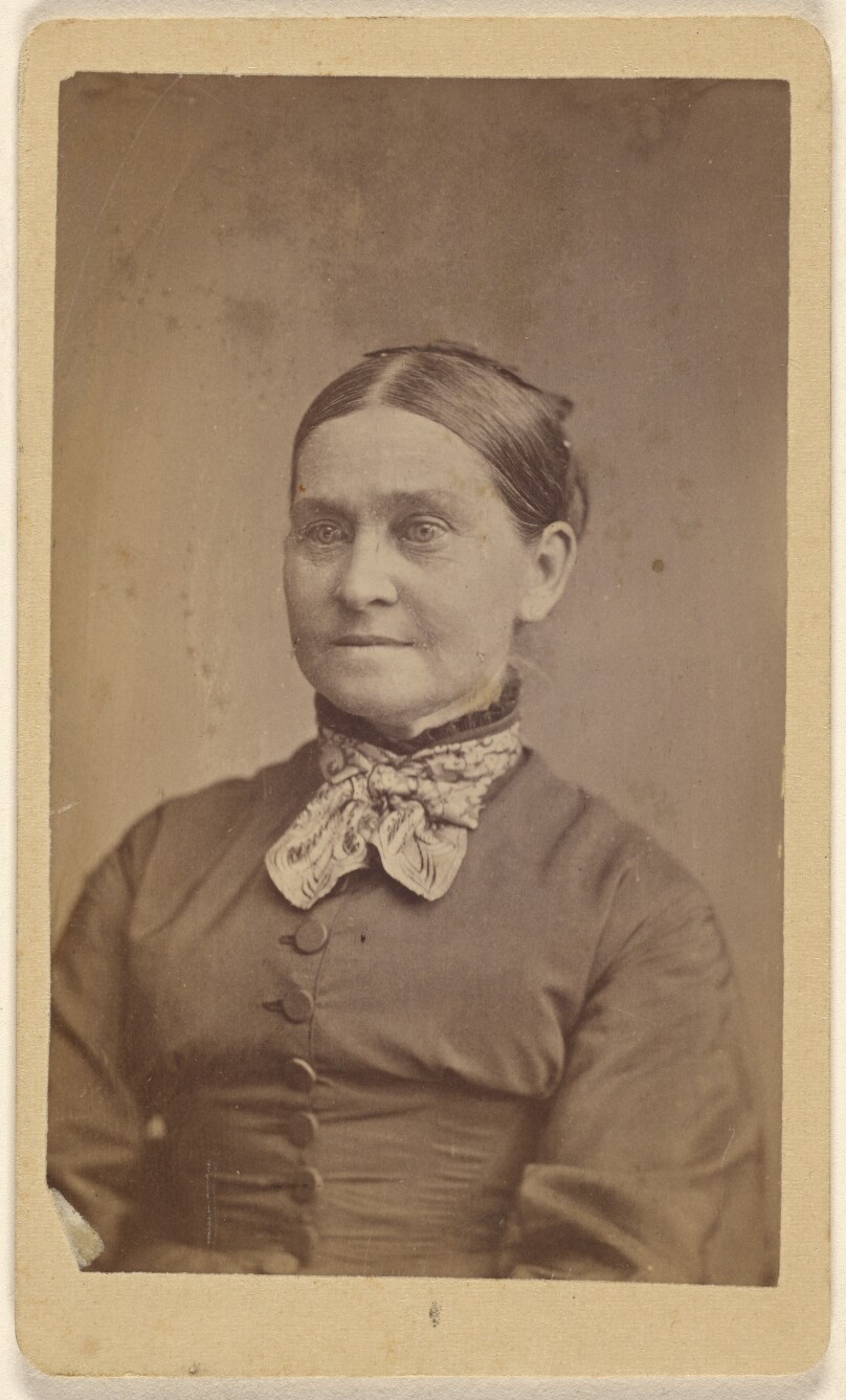 [Unidentified woman, seated]