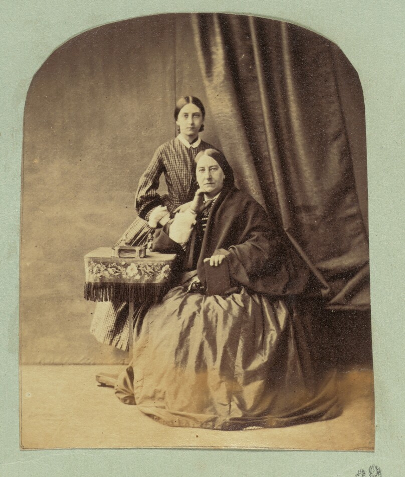 [Portrait of woman and girl]