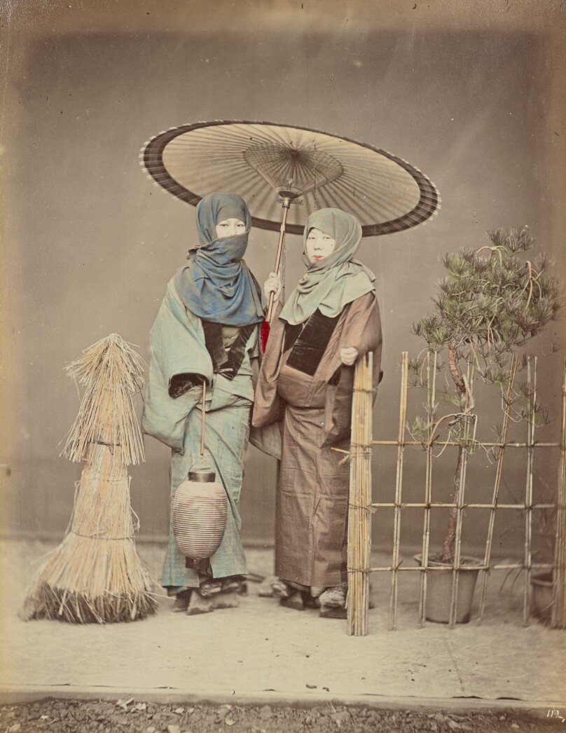 Girls Carrying Paper Lantern in Winter Evening
