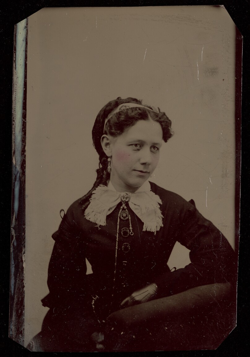 [Unidentified woman, seated]