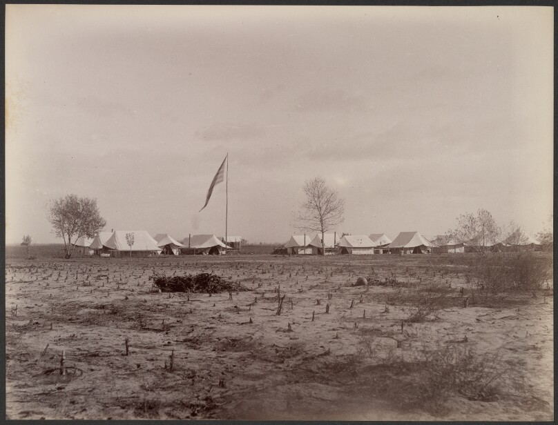 [Camp Site, Flag, and Stumps]