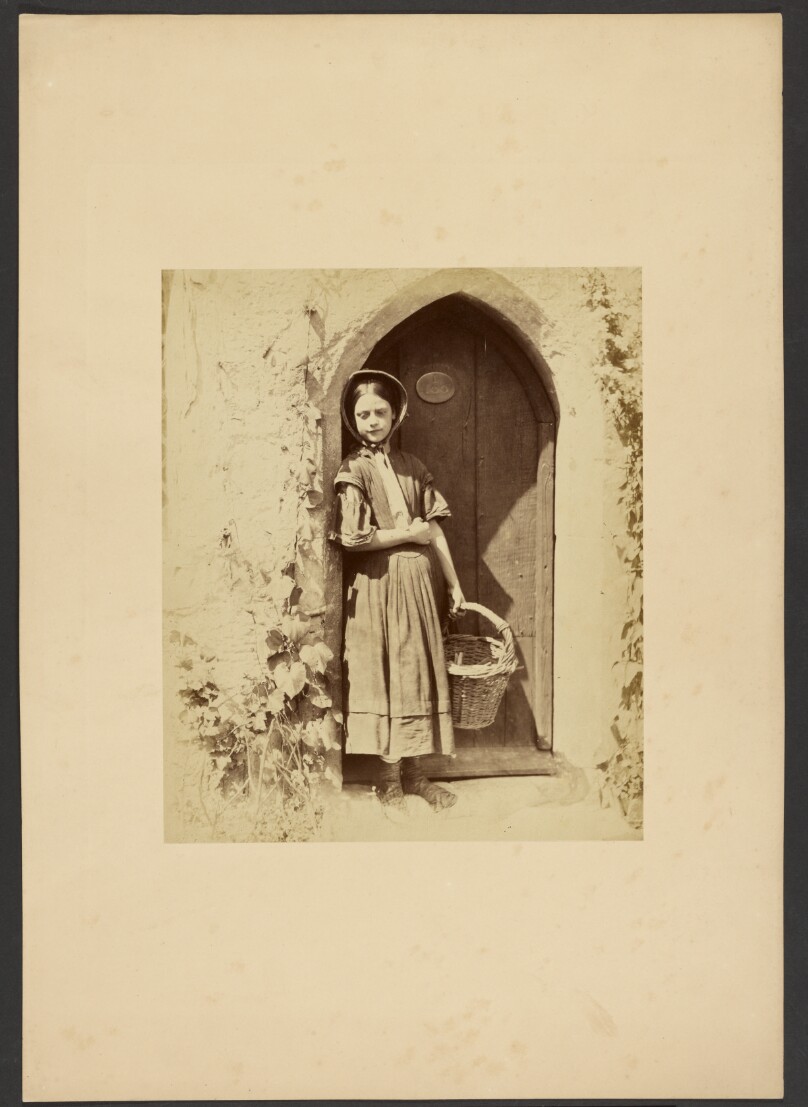 [Girl standing in doorway]