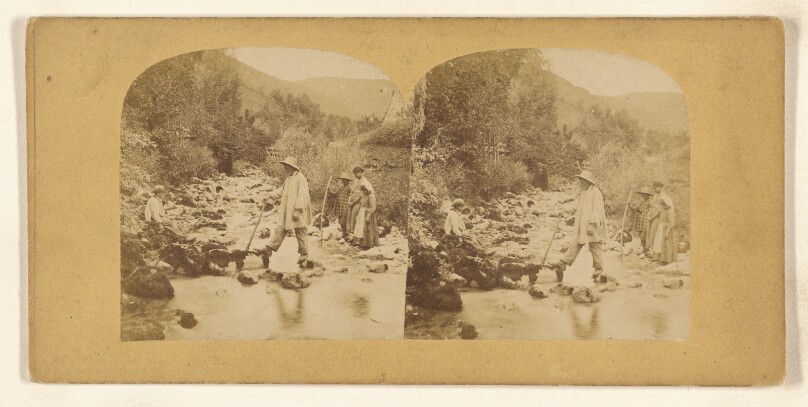 [Group of people, possibly a family, fording a stream]
