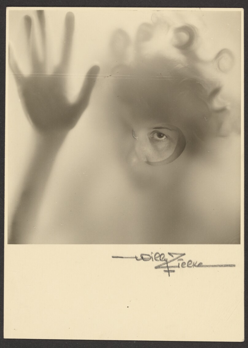 [Face pressed against glass]