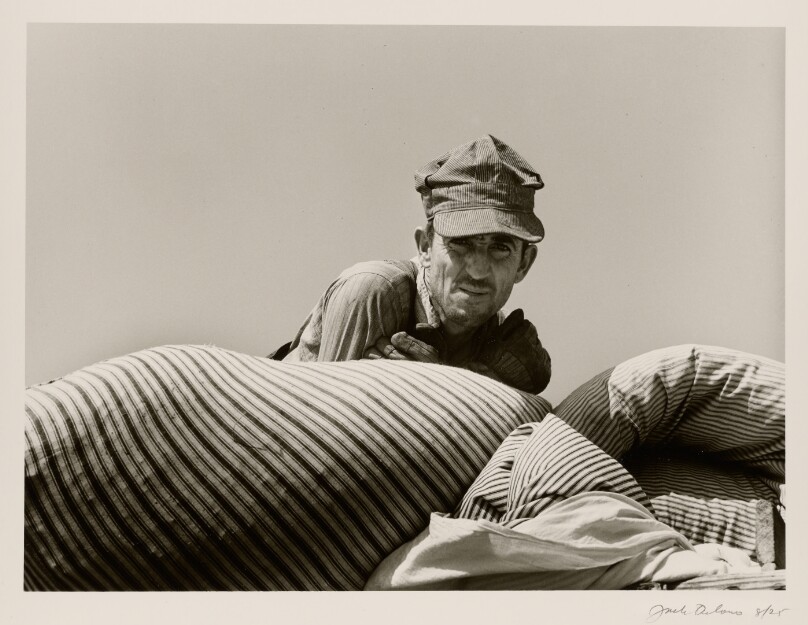 [Man with Striped Cap]