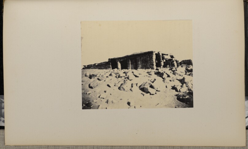 [Temple ruins atop a hill]