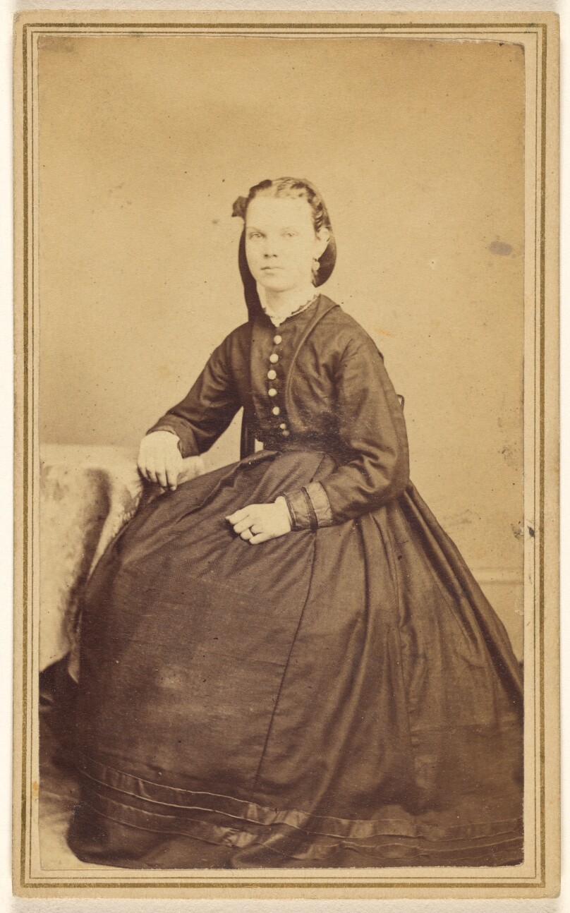 [Unidentified woman, seated]