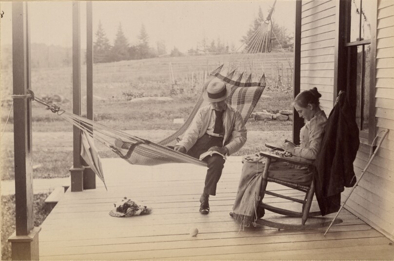 [Man and woman on porch]